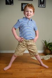 red haried boy posing