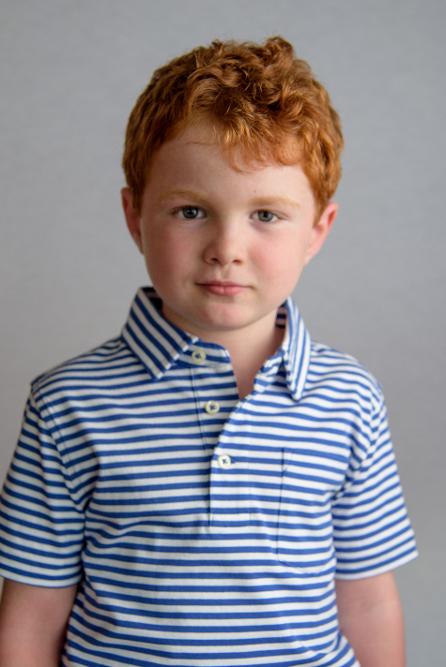 small cute boy with red hair