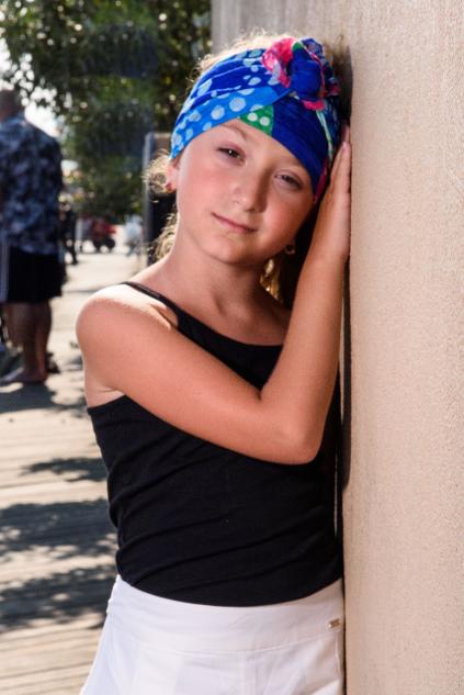 young girl with do rag at coney island