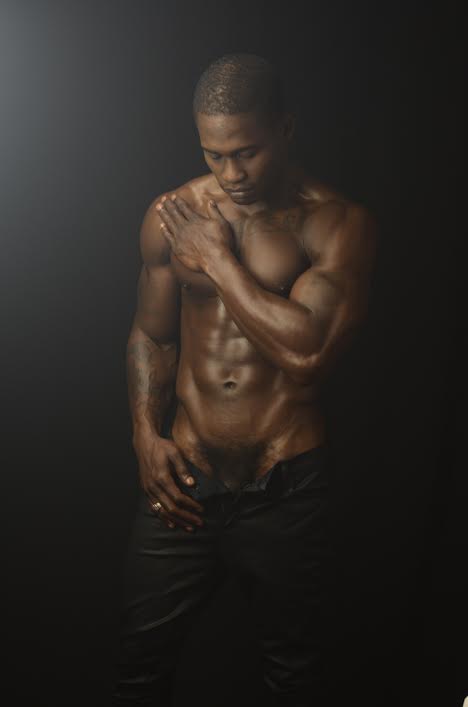 muscular black man low key portrait