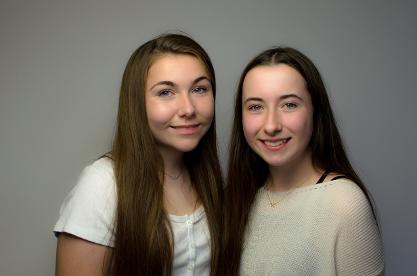 Two highschool girs headshot