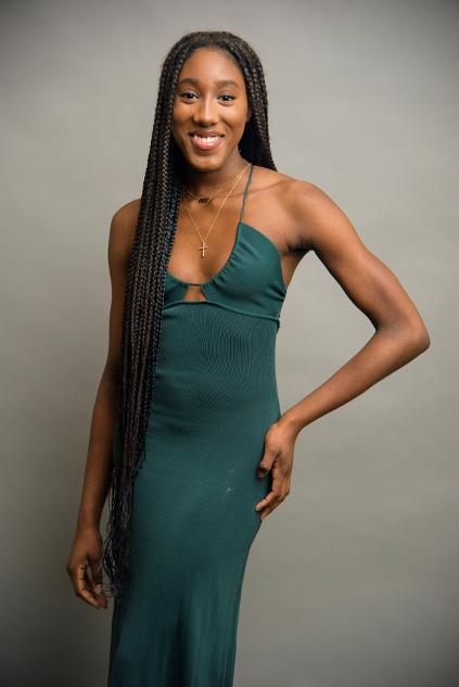 young woman in a green dress
