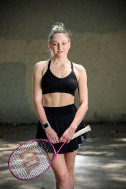 Girl playing tennis photo